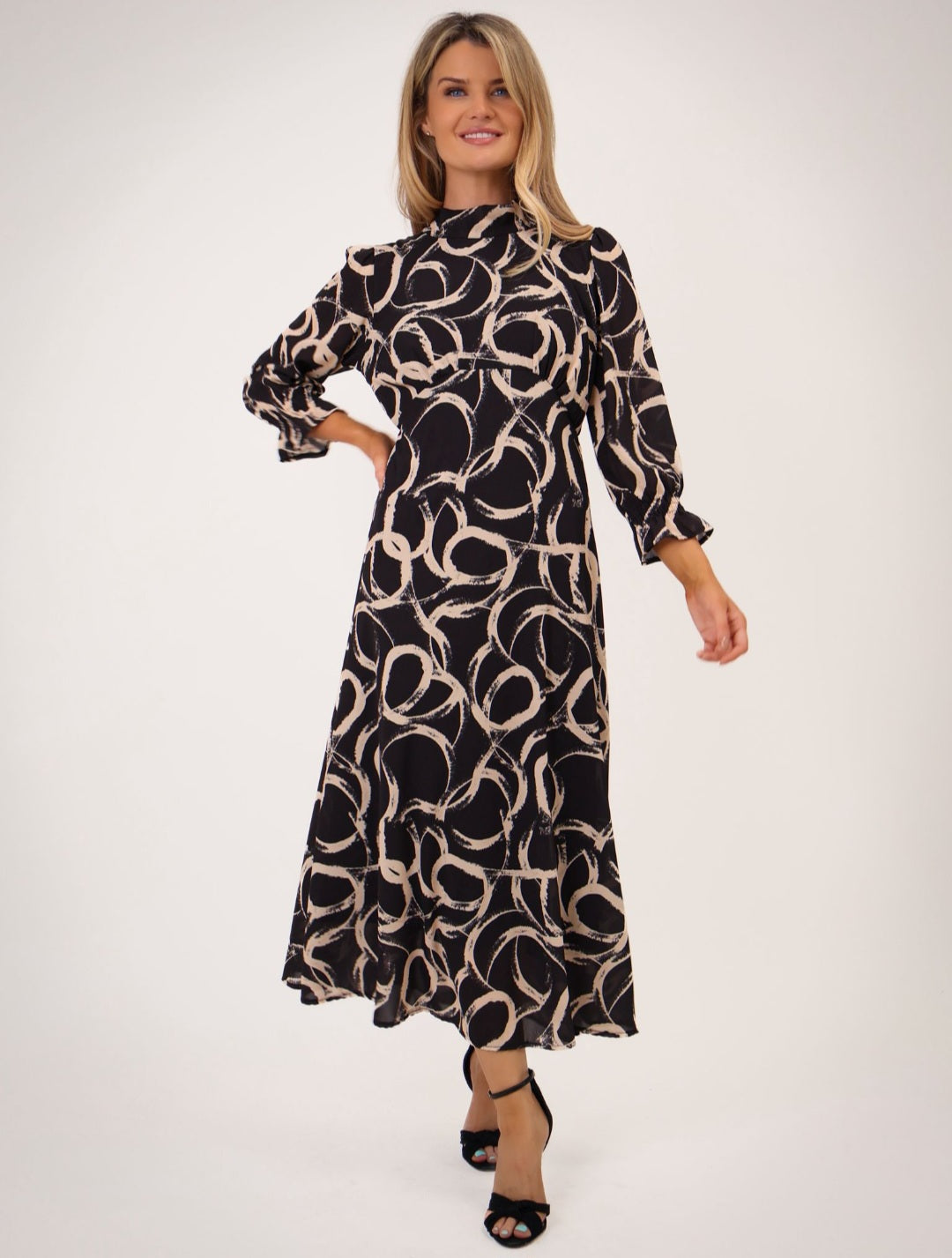 kate and pippa black and cream dress